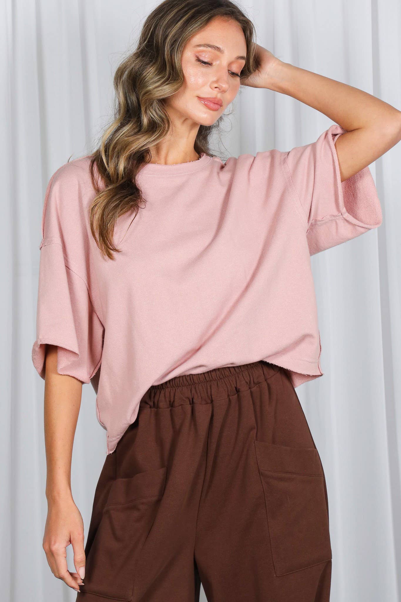 Vintage-Inspired Cut Edge Knit Top: Blush