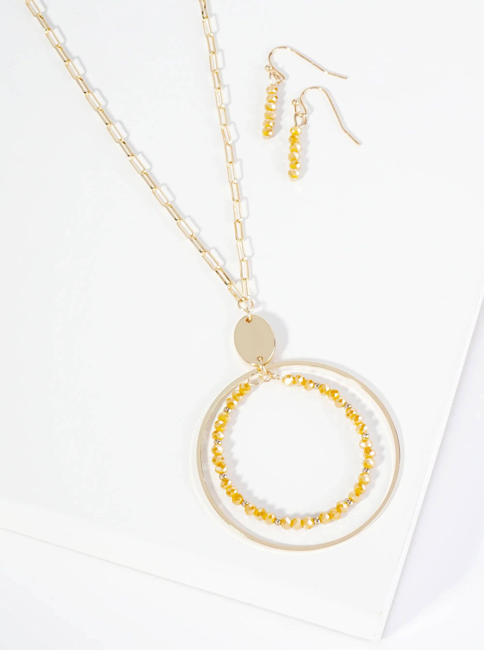 Glass Beaded Double Circle Pendant 30 Inch Long Necklace Set With Earrings: Mustard