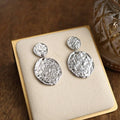 Golden Muse – Two Disc Textured Earrings: Silver Tone