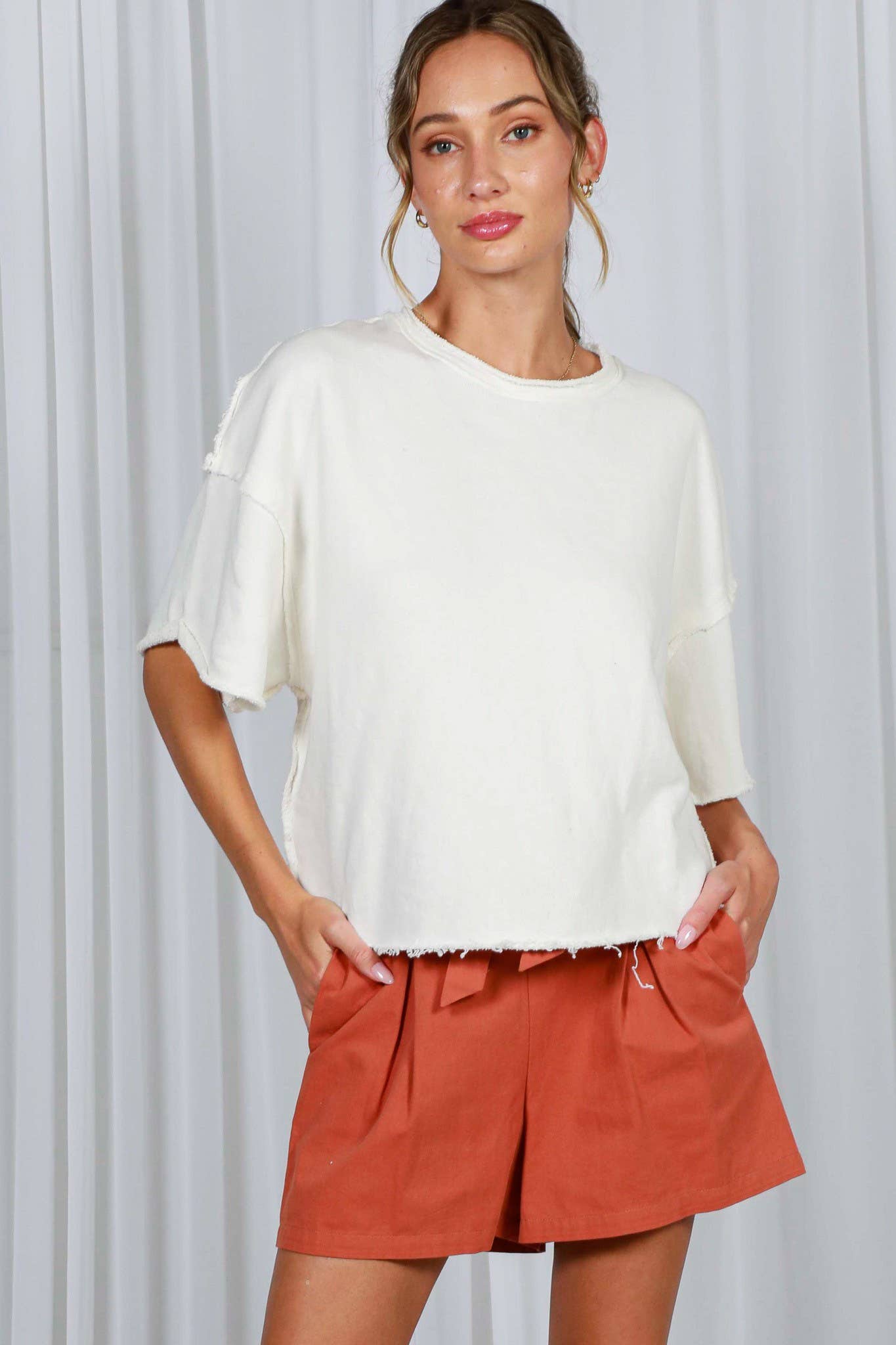 Vintage-Inspired Cut Edge Knit Top: Cream