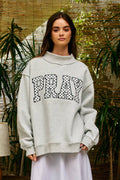 PRAY Embroidered Mock Neck Sweatshirt