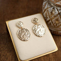 Golden Muse – Two Disc Textured Earrings: Gold Tone