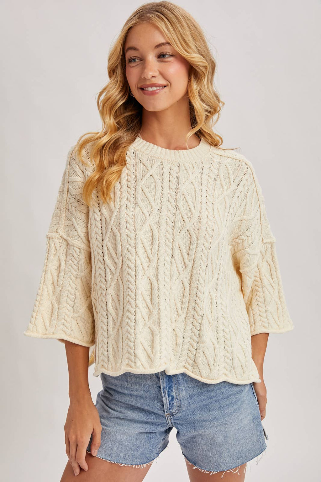 OVERSIZED BELL SLEEVE CABLE KNIT SWEATER: CREAM