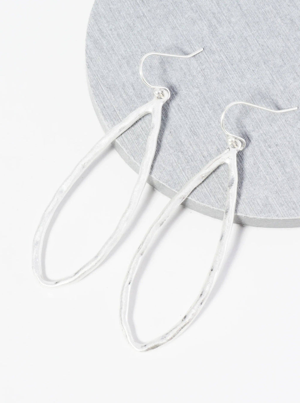 Hammered Metal Elongated Teardrop Dangle Earrings: WORN SILVER