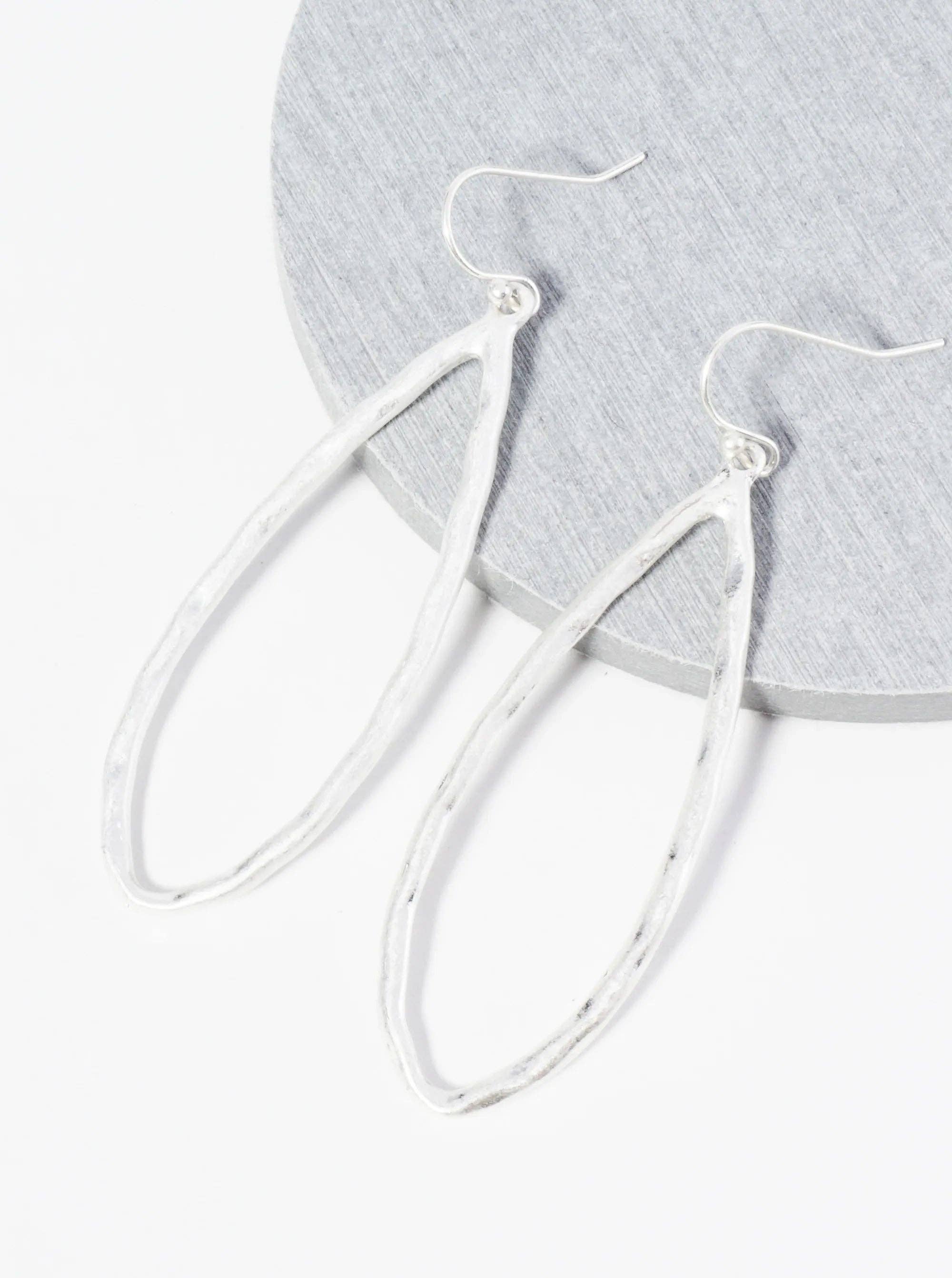 Hammered Metal Elongated Teardrop Dangle Earrings: WORN SILVER