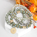 Beaded bracelets set in Olive green with a coin charm
